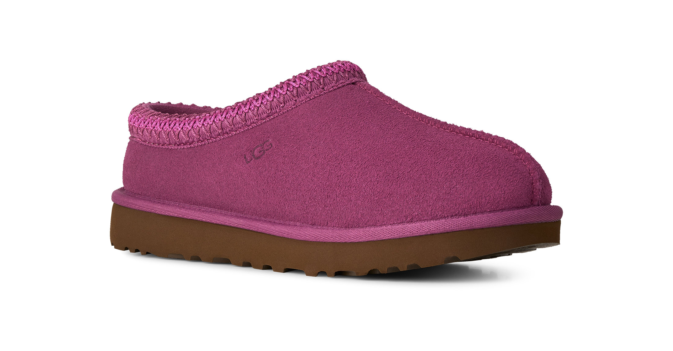 A single UGG slip-on clog shoe in a vibrant magenta pink suede-like material with a matching pink braided trim and a brown rubber sole, shown against a plain white background.