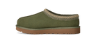 An olive green suede slipper with a brown rubber sole and a beige knit trim around the collar, shown from a side profile on a white background.