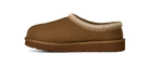 A single brown suede slipper with a textured cream knit trim around the collar and a thick brown sole, shown in profile against a white background.