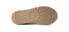 Close-up of a brown shoe sole on a white background