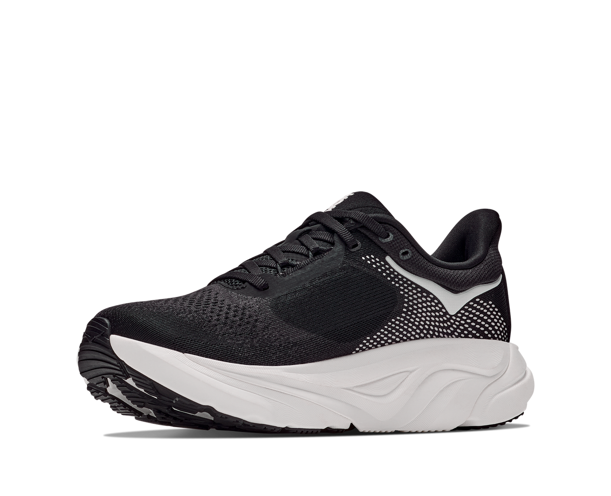 Black running shoe with white sole on a white background