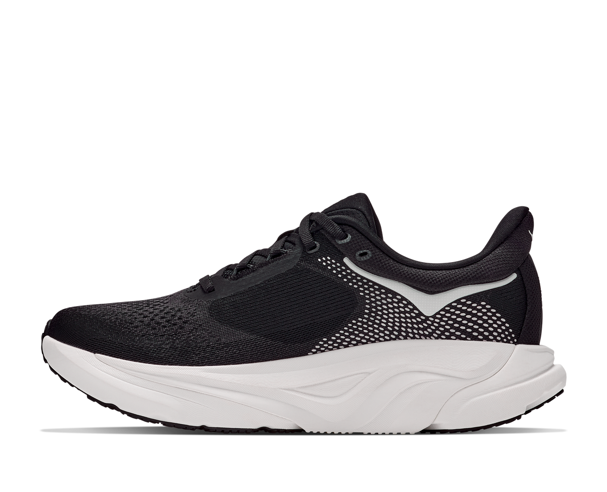 Black running shoe with white sole on a white background