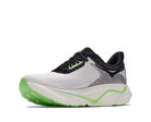 A single athletic running shoe shown in profile against a solid white background. The shoe features a white mesh upper with black accents, a black and white patterned side panel, a thick white midsole with a light blue accent line, and a bright green outsole and heel accent.