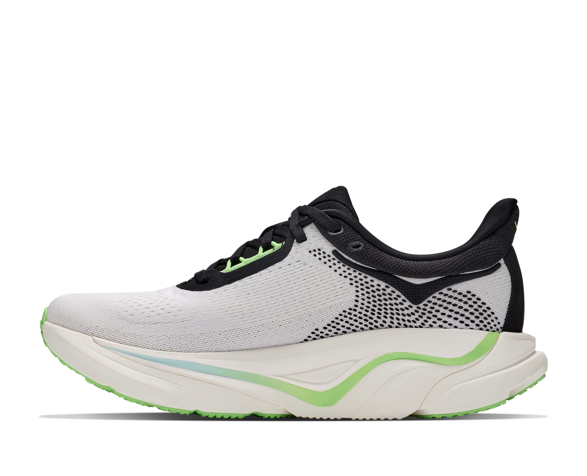 A white and black running shoe with bright green accents, shown in a clean profile view against a solid white background.