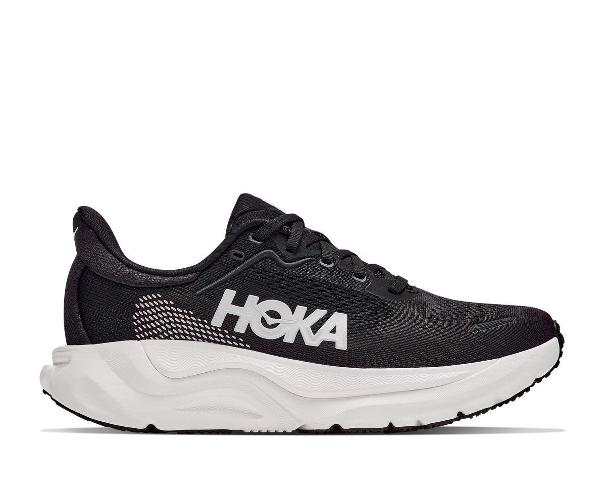 Black Hoka running shoe on a white background