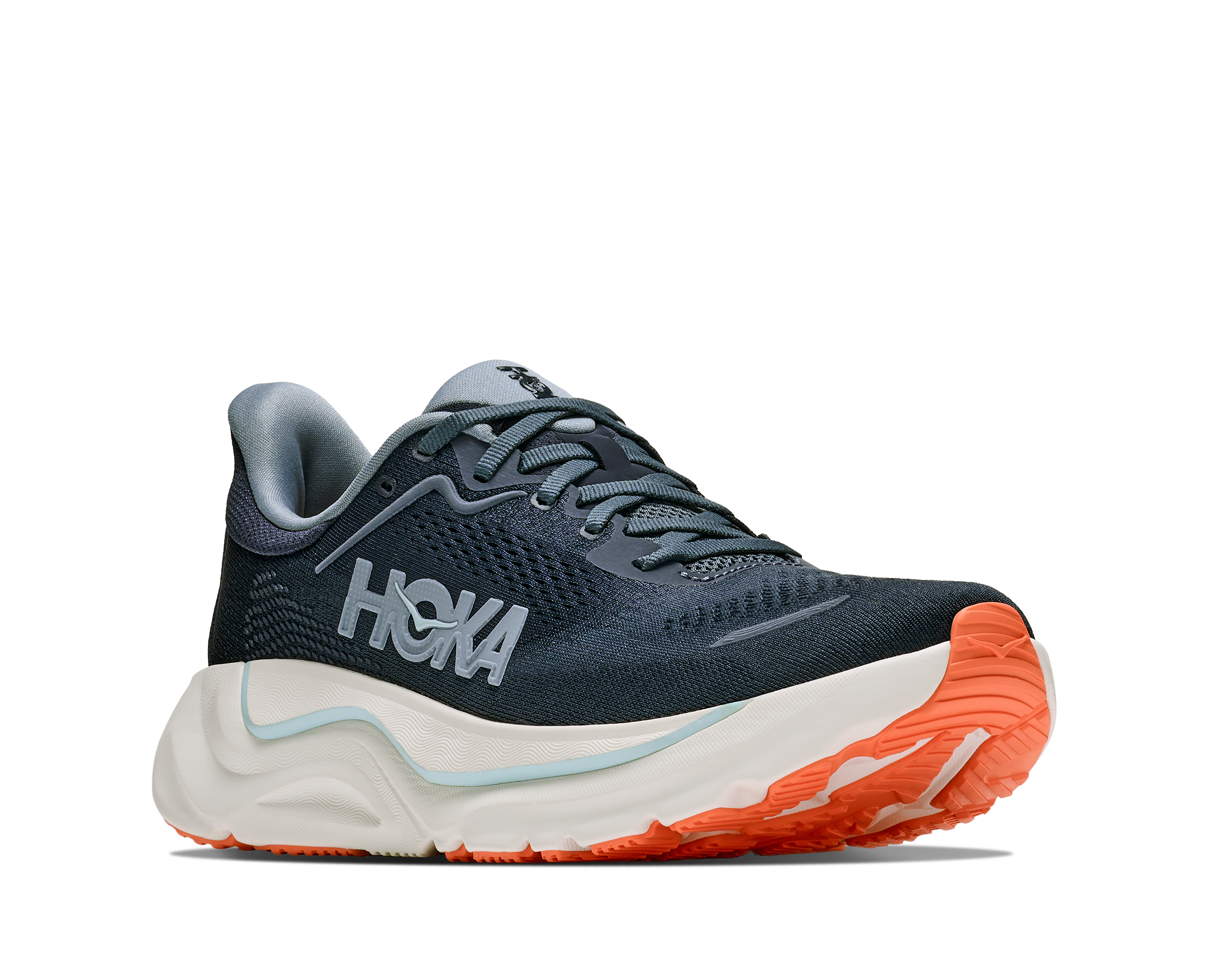 Navy running shoe with orange sole on a white background
