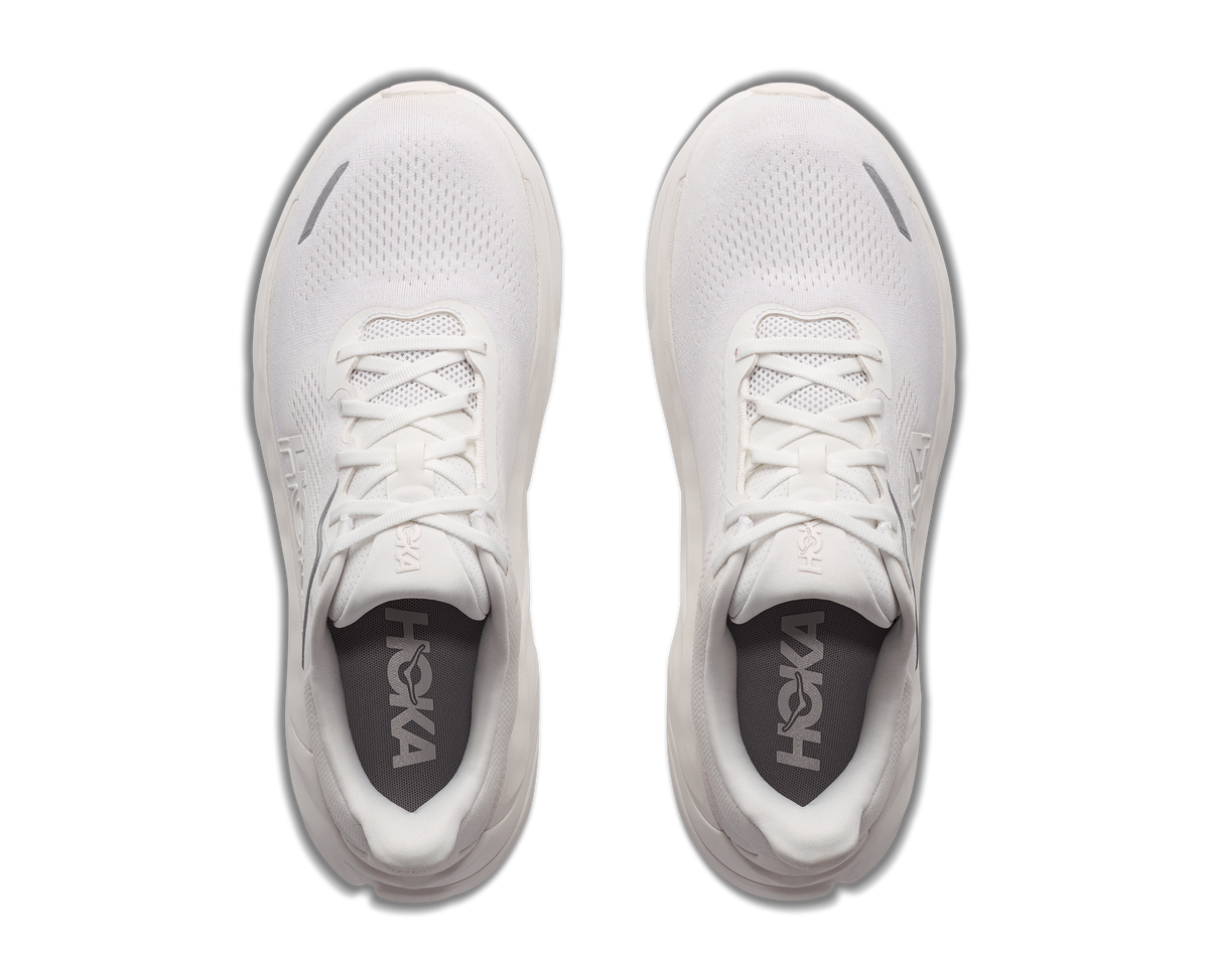 A pair of white Hoka running shoes shown from a top-down view on a plain white background.