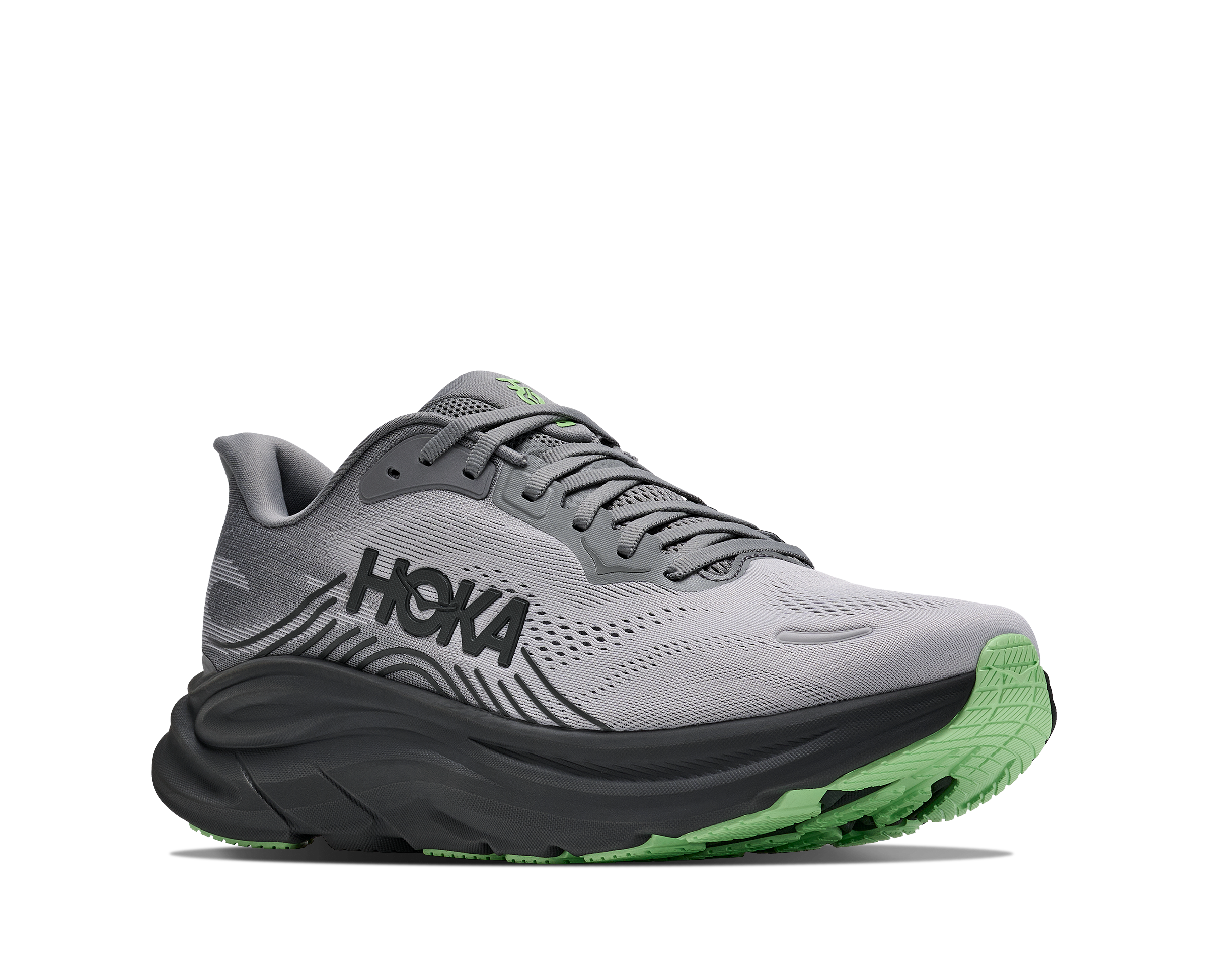 Gray running shoe with green sole on a white background