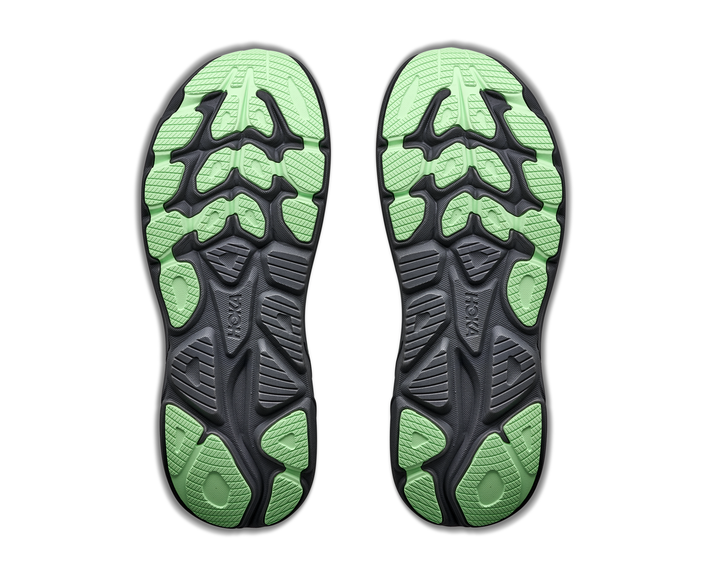 Green and black shoe sole on a white background