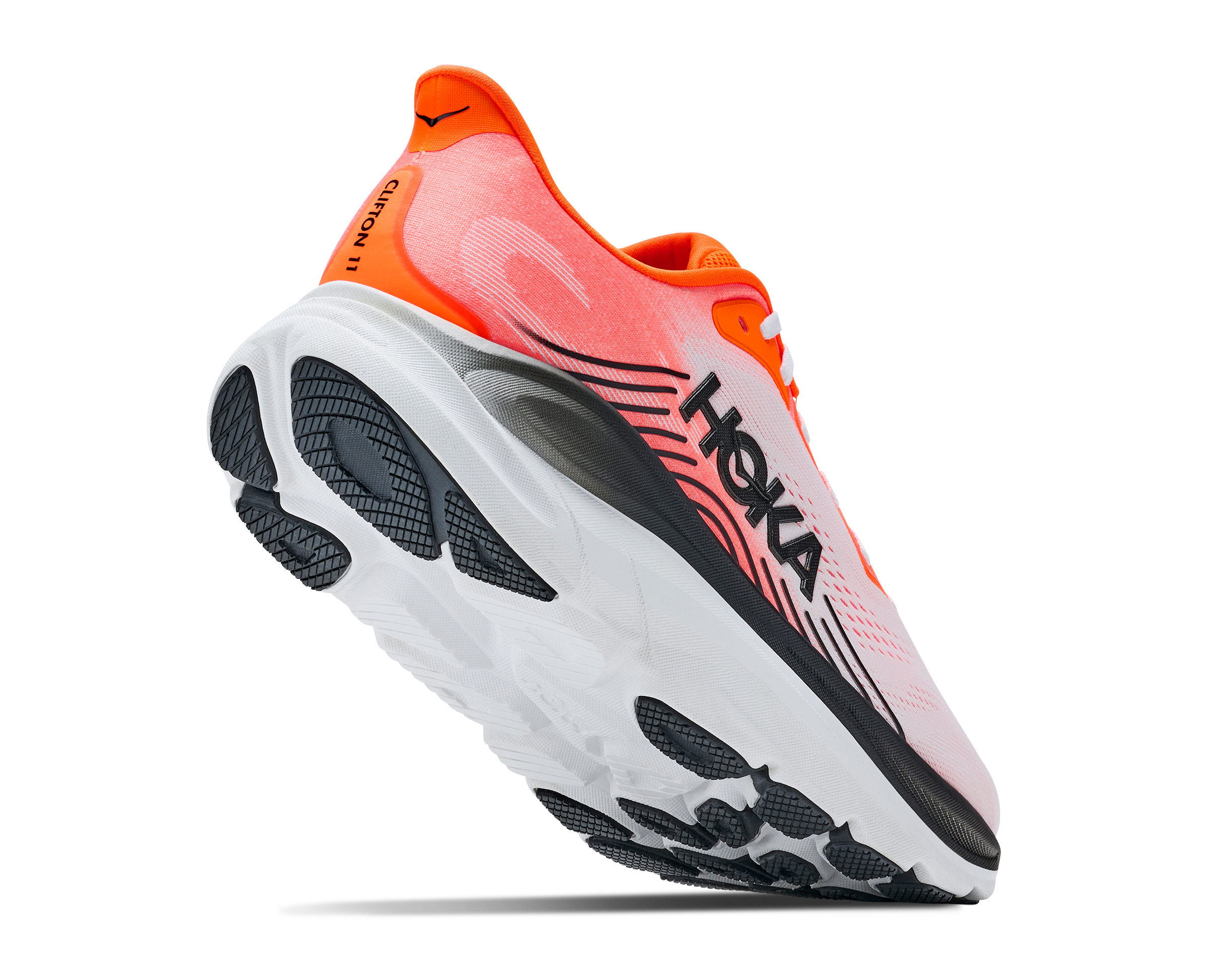 Hoka running shoe with orange and black design on a white background