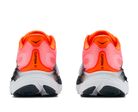 Pair of orange and black running shoes on a white background