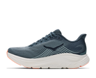Blue running shoe with white sole on a white background