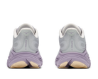 Pair of gray running shoes with purple soles on a white background