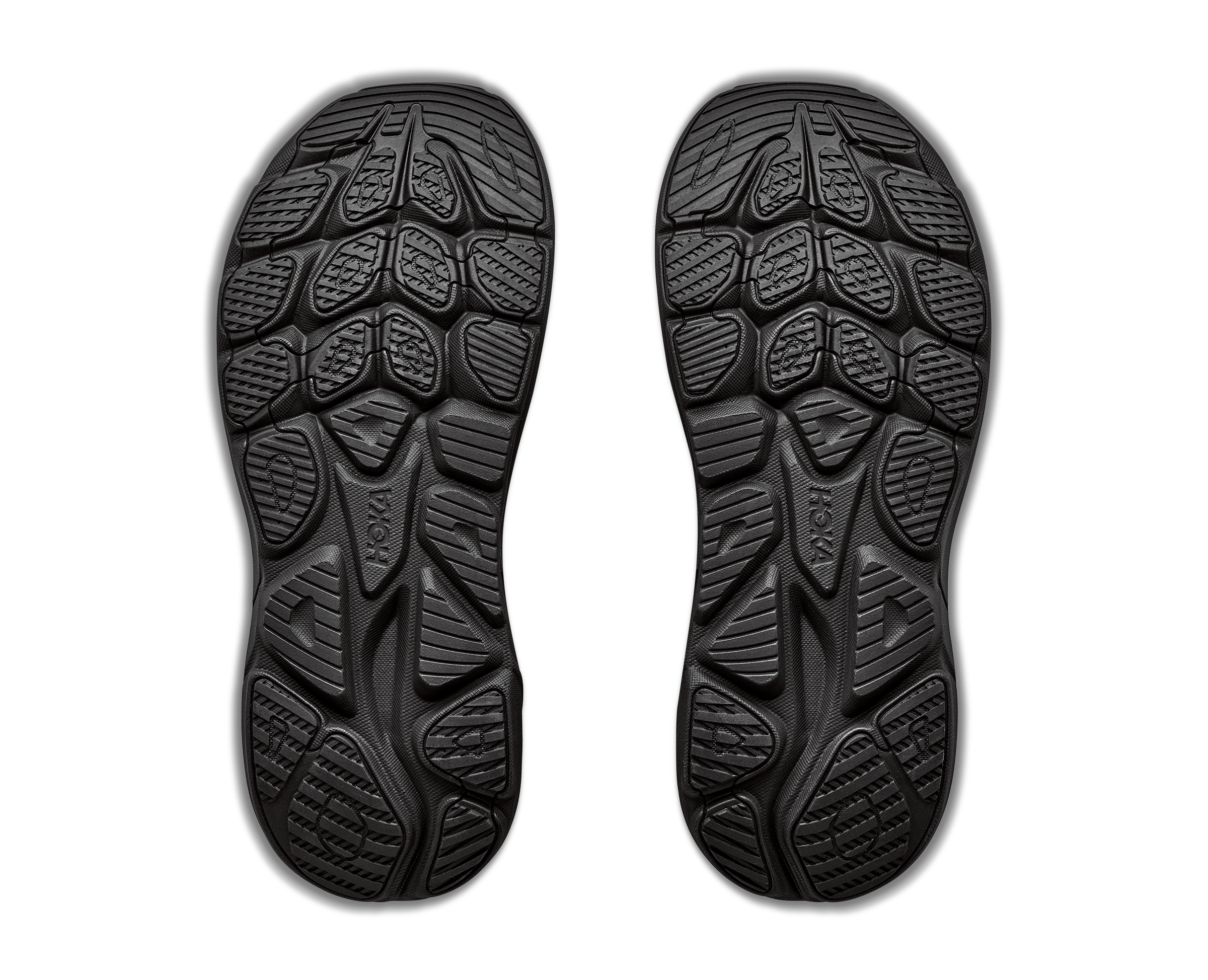 Black shoe sole with tread pattern on a white background