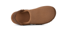 A single brown slip-on shoe shown from a top-down view against a solid white background.