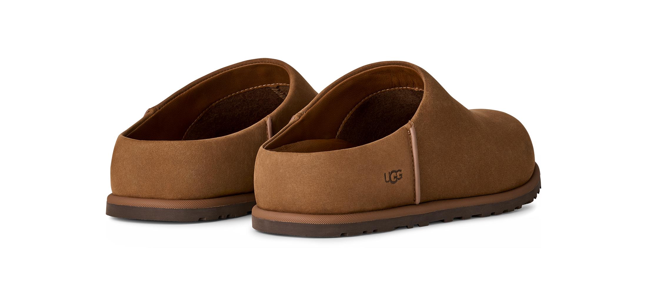 Brown slippers with UGG logo on a white background