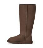 A single mid-calf suede boot in a warm brown color, shown from a side profile against a plain white background.