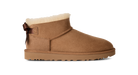 Brown suede boot with white fur lining on a white background