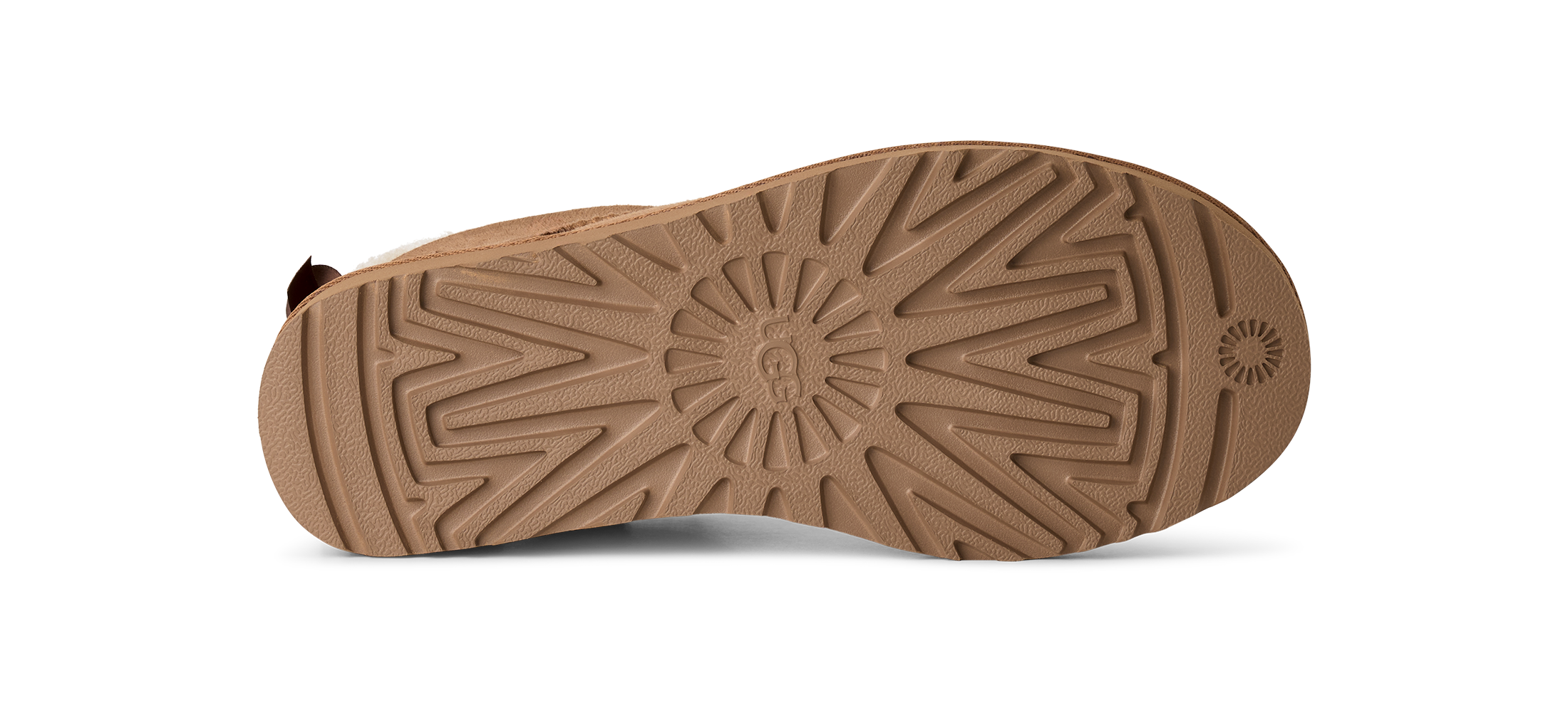 Brown sole of a shoe on a white background