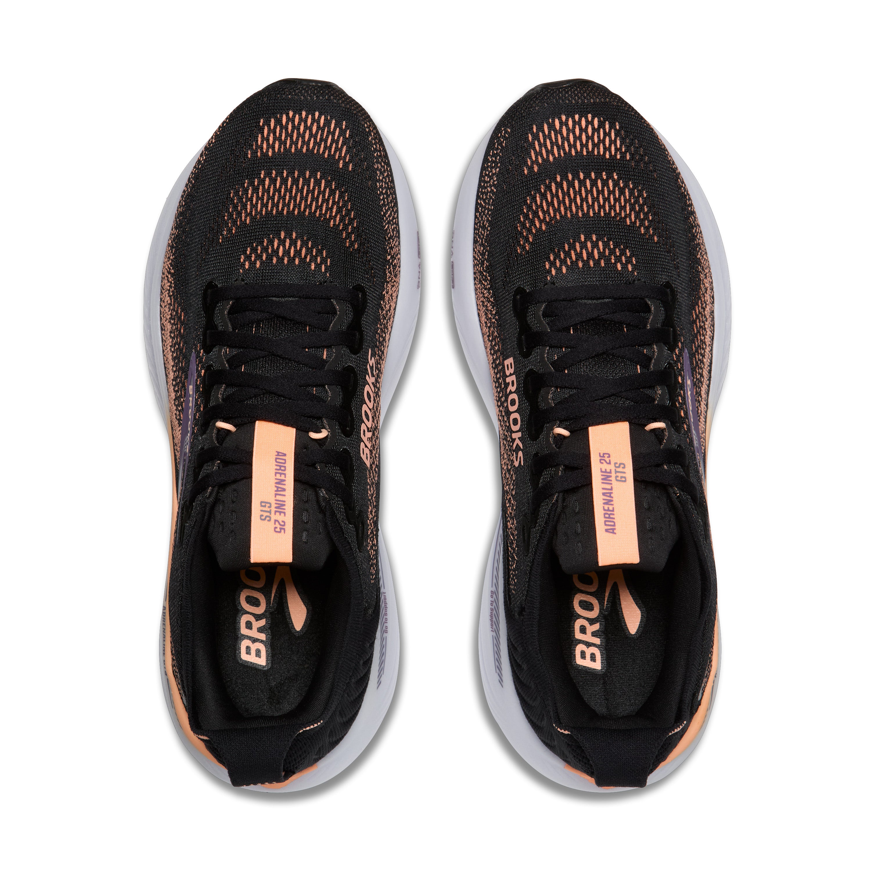 Black running shoes with orange accents on a white background