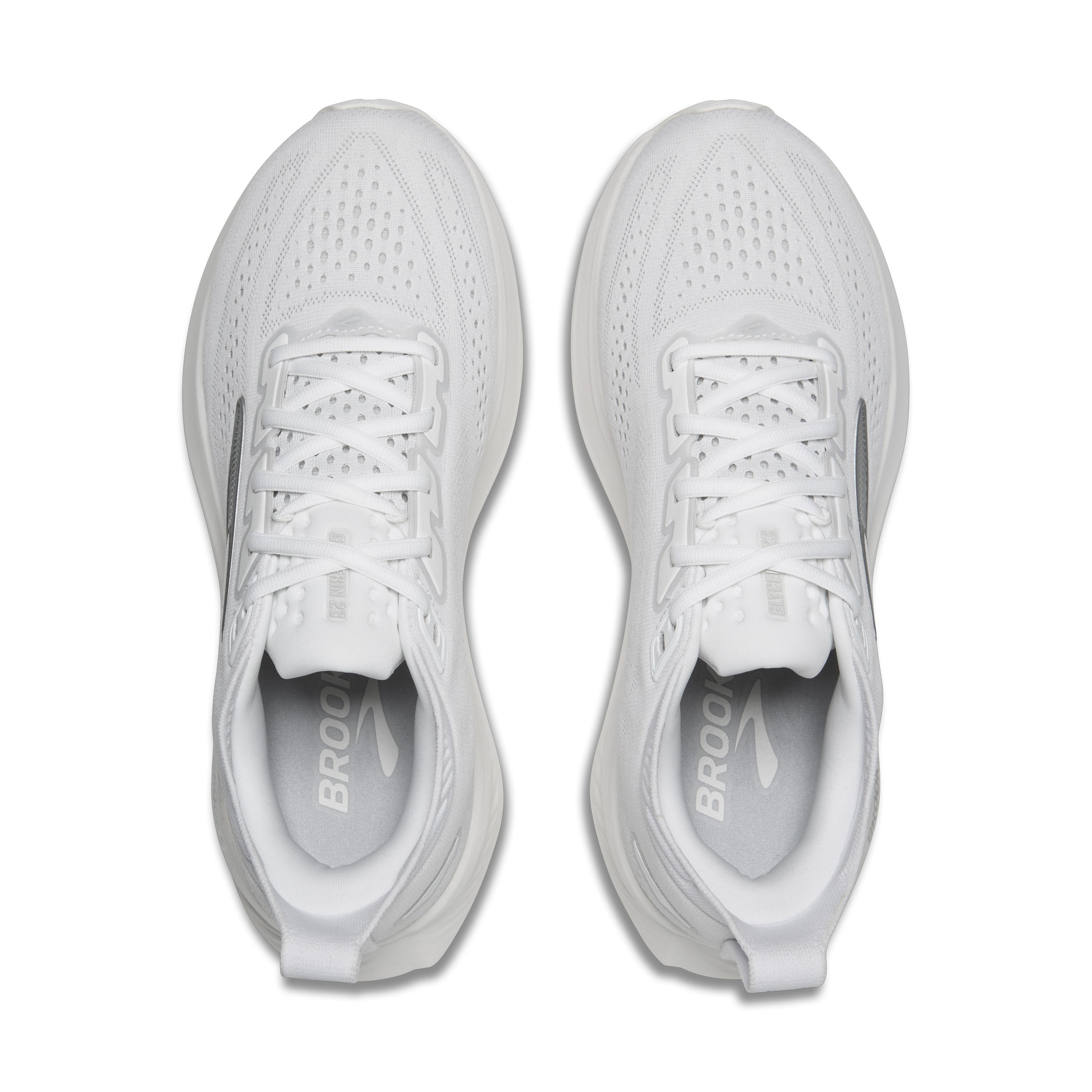 Pair of white running shoes on a white background