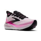 Pink and black running shoe on a white background