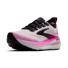 Pink and black running shoe on a white background