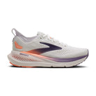 White running shoe with purple and orange accents on a white background