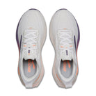 White running shoes with purple and orange accents on a white background