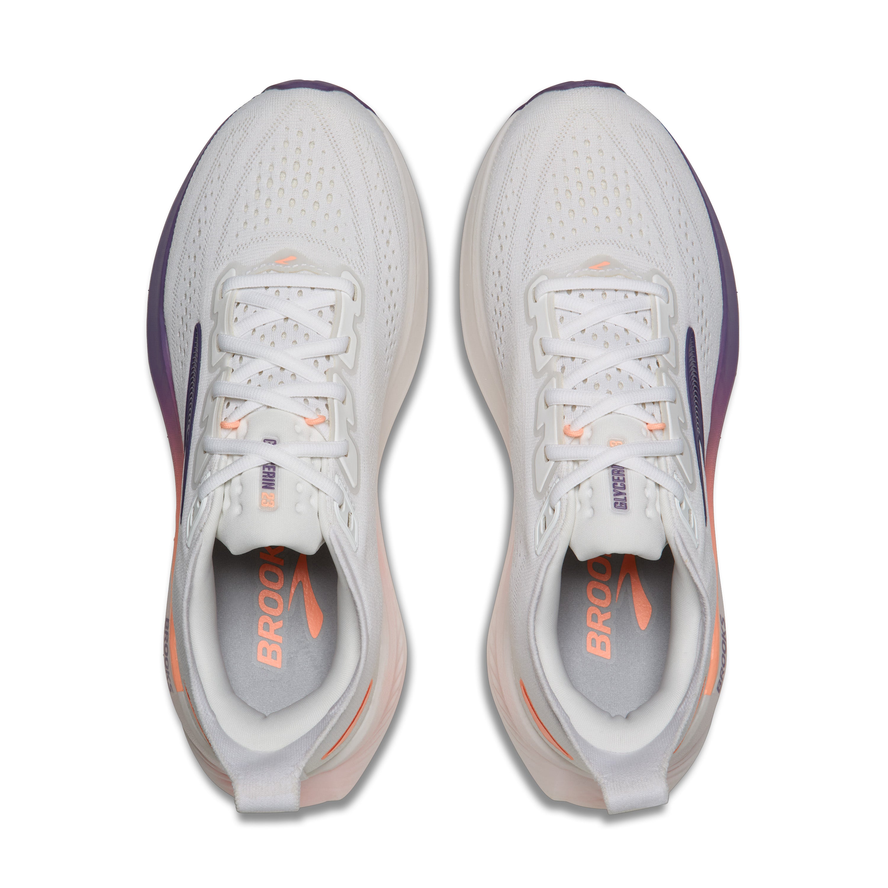 White running shoes with purple and orange accents on a white background