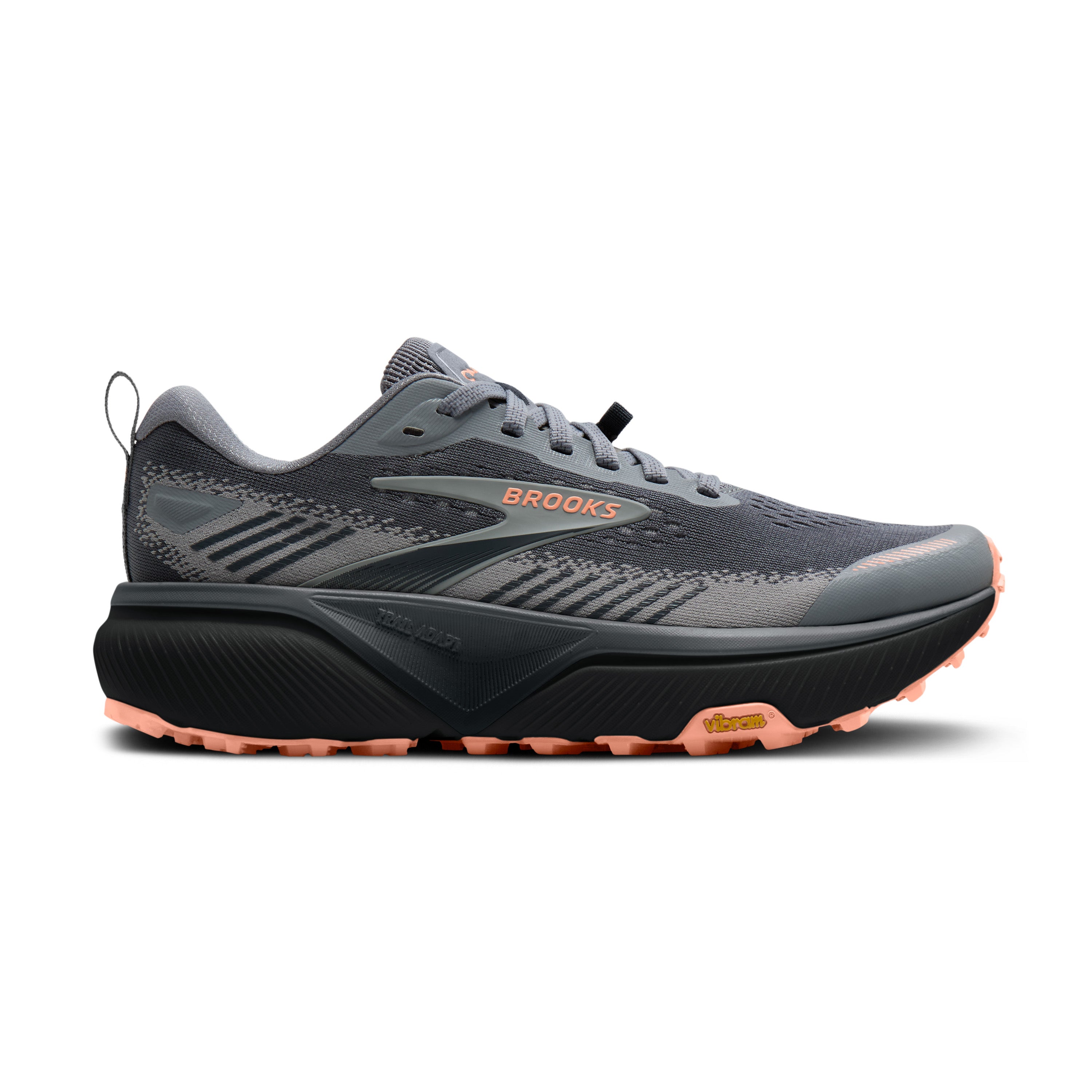 Gray running shoe with orange sole on a white background