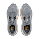 Gray running shoes with visible branding on a white background