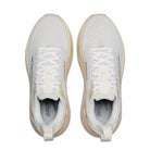 White running shoes with tan soles on a white background