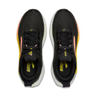 Black running shoes with yellow accents on a white background