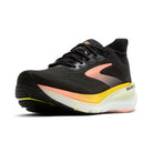Black running shoe with pink and yellow accents on a white background