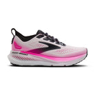 Pink and white running shoe with black accents on a white background