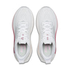 White running shoes with pink accents on a white background