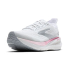White running shoe with pink accents on a white background