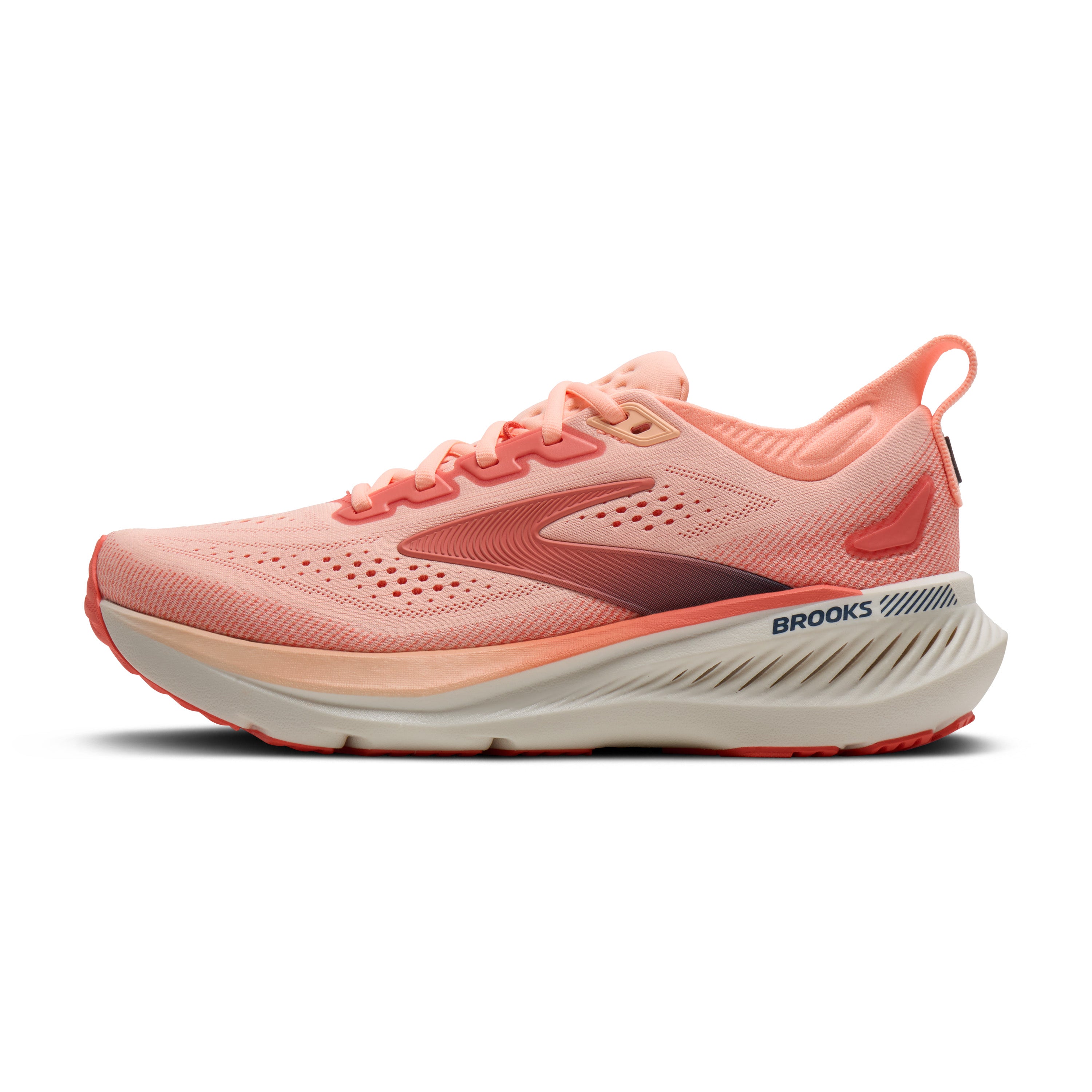 Pink running shoe with white sole on a white background