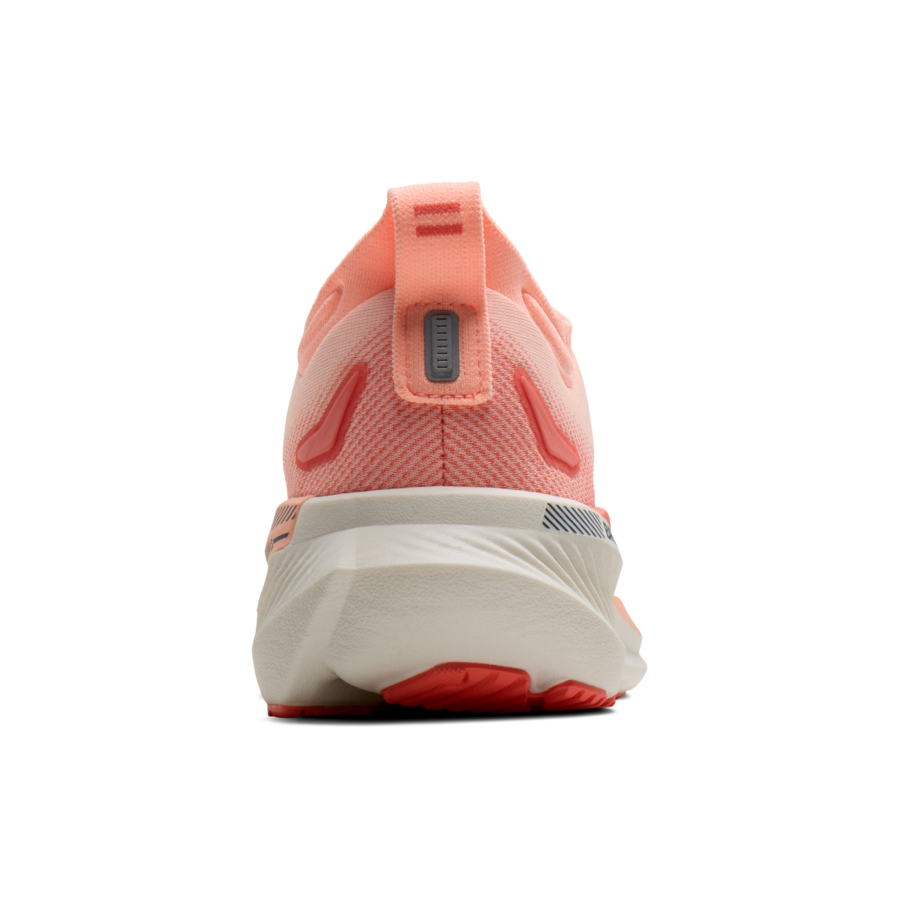 Coral running shoe with white sole on a white background