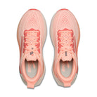 Pair of pink running shoes on a white background