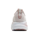 A rear view of a light pink and white athletic shoe on a solid white background.
