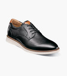 Brown leather shoe on a white background