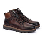 Pair of brown leather boots on a white background