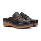 A pair of black leather slip-on clogs with dark brown straps and natural wood-look wedge soles, shown on a clean white background.