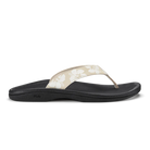 Black and beige sandal on a white background