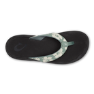 Black sandal with floral strap on a white background