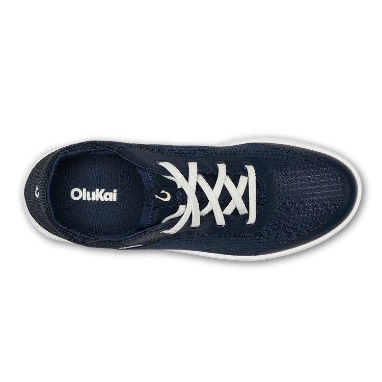Navy blue sneaker with white laces on a white background