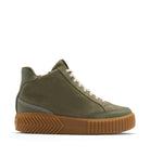 An olive green high-top sneaker by sOREL, featuring a suede and mesh upper, white laces, and a thick brown textured sole, shown from a side profile on a white background.
