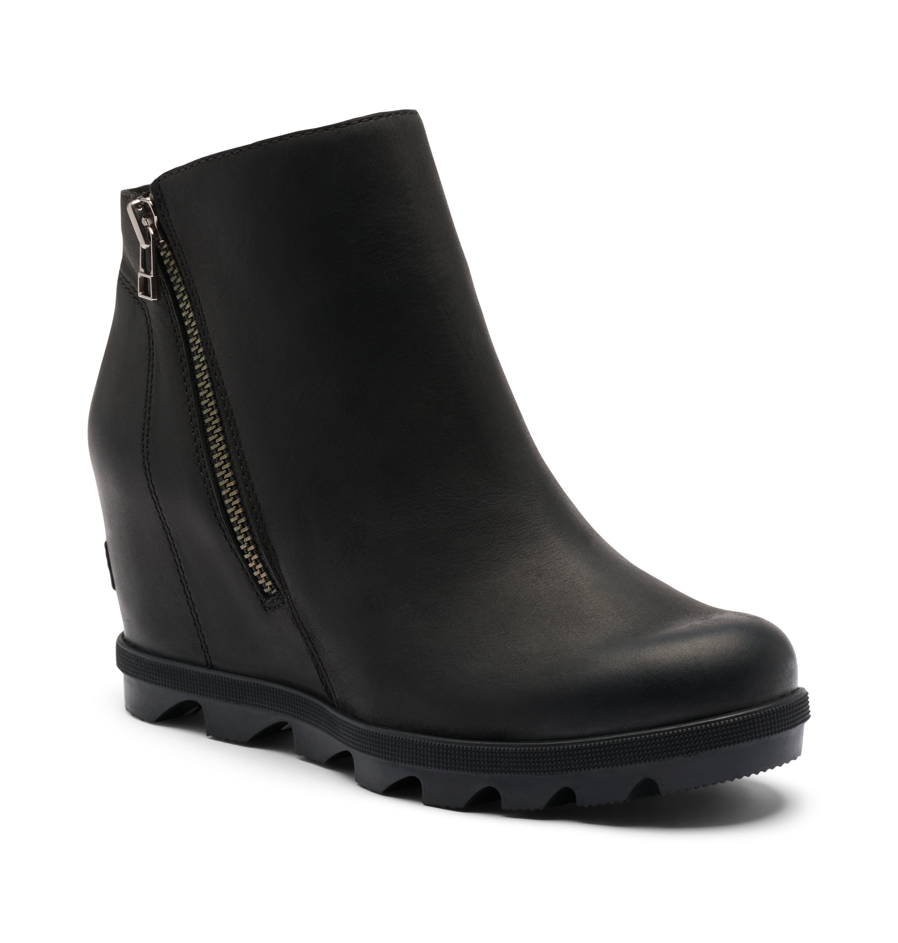 A black leather wedge ankle boot with a side zipper and a chunky lug sole, shown from a three-quarters angle on a white background.
